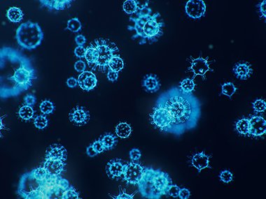 Illustration of Coronavirus on a black background.