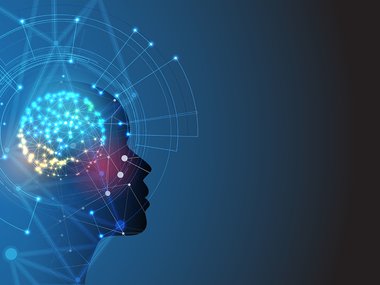 A right-facing silhouette of a human head with a multicolored circle and interconnected lines in place of the brain.