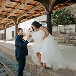 Bride stepping down and groom assisting.jpg