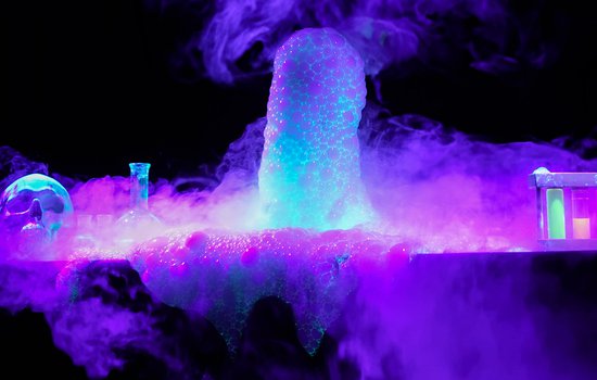 Black light and chemical reaction demonstrations at the event Glow