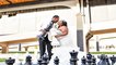 bride and groom posing with outdoor chess set.jpg