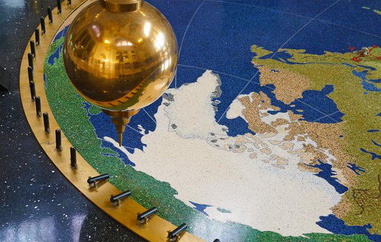 Close up of Foucault pendulum by Justin Hankins Photography