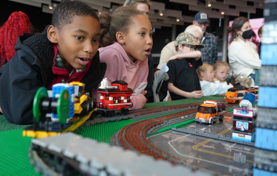 two children overlooking model railroad display with amazement.jpg