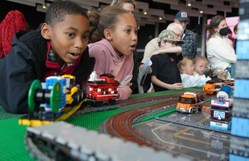 two children overlooking model railroad display with amazement.jpg