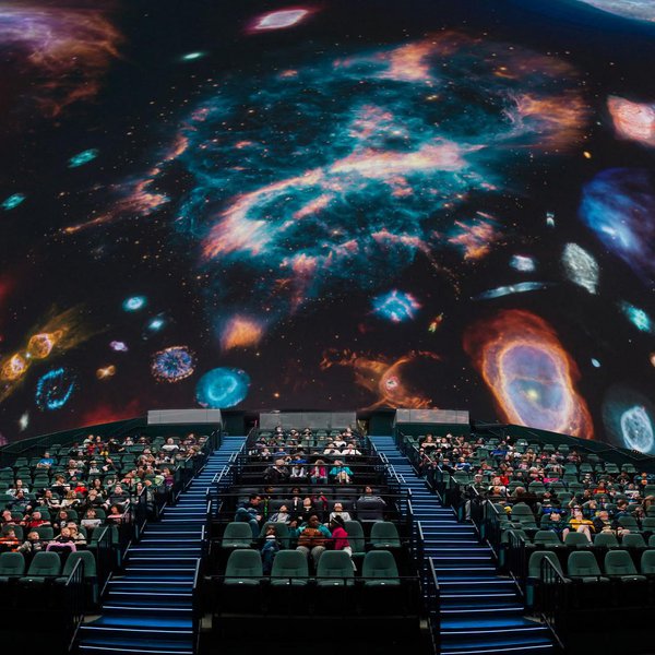 Front View inside The Dome featuring a galaxy on the screen
