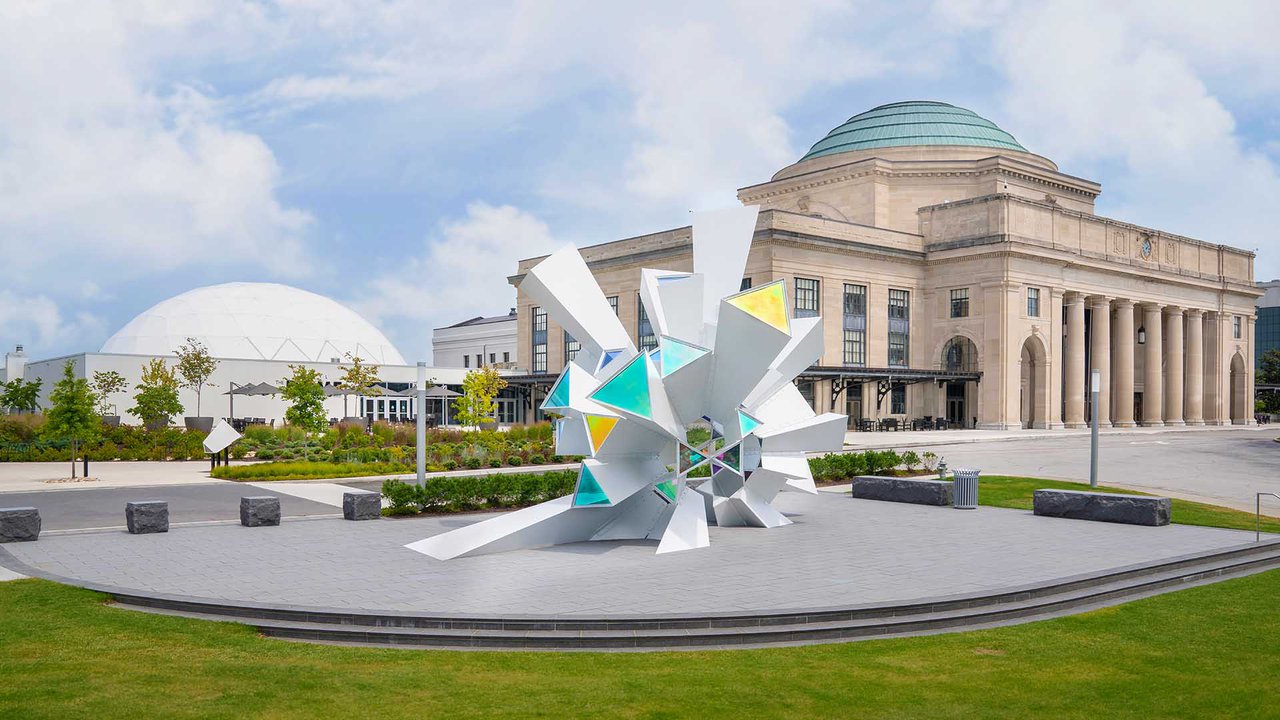 Exterior photograph of the Science Museum of Virginia and the sculpture Cosmic Perception