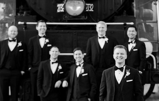 Groomsmen by Chesapeake and Ohio train by Justin Hankins Photography