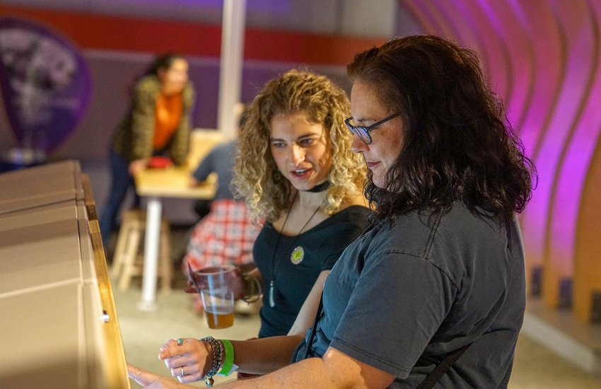 Guests enjoying Boost exhibition during Science on Tap