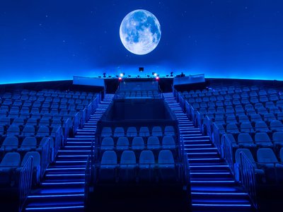Image of Dome theater with moon by Sean Dewitt
