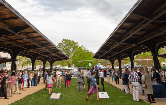 Image of group playing games and enjoying the Thalhimer Pavilion exterior by Michael Simon