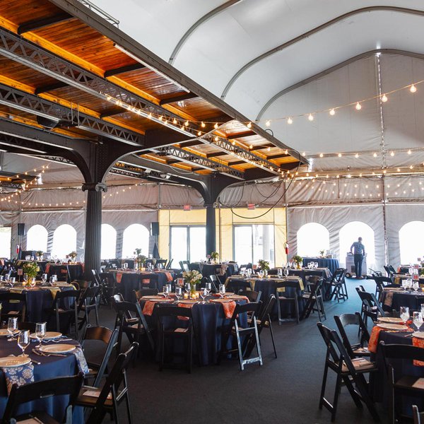 Image of Thalhimer Pavilion with tables setup during the day by Michael Simon