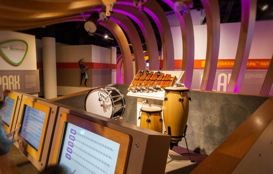 Image of children playing with sound machine in Boost