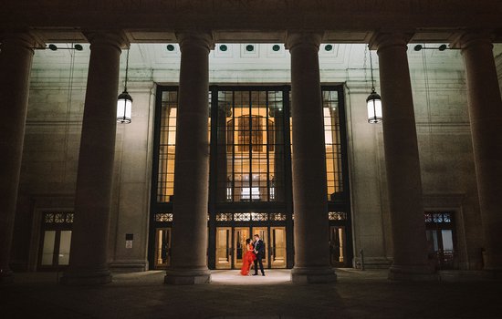 Image of wedding couple at night outside of the Science Museum by 2022 Wild-Heart-Co.jpg