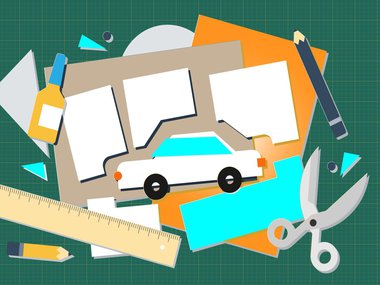 Scissors, pencil, ruler and car on a colorful cutout collage and cutting mat background for the summer camp Maker Magic.
