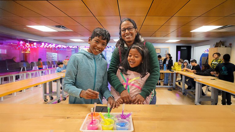 adult and two children enjoying time in The Forge.jpg
