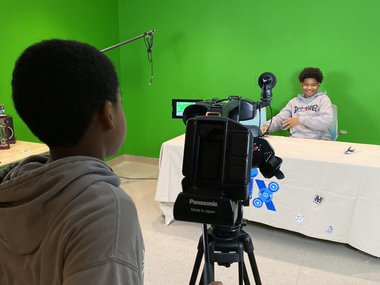 teenagers using a green screen for filming in the MiX.jpg