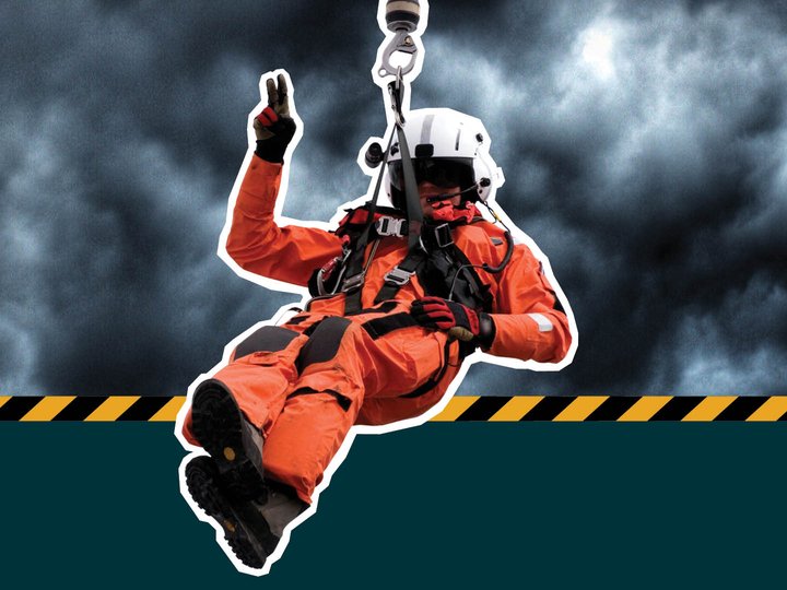 Rescue worker wearing a bright orange flight suit and white helmet, suspended by a hoist cable and flashing a peace sign. The rescue worker is superimposed against a dark stormy sky background with yellow and black hazard banner
