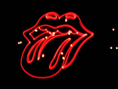 Red outline of lips and a tongue sticking out