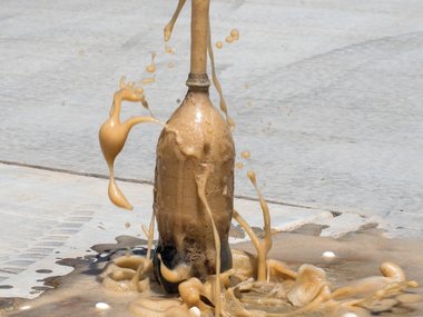 a exploding bottle of soda