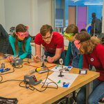 Teens working on a project in The MiX