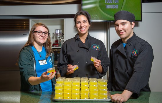 Museum team members and a volunteer in the Boost kitchen.