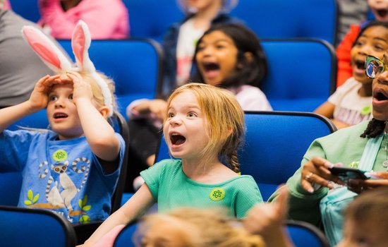 group of children observing a scientific demonstration.jpg