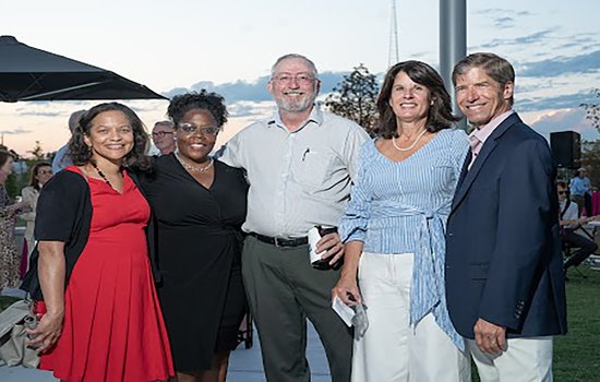 decorative: group of Supporting Members enjoying an event out on The Green