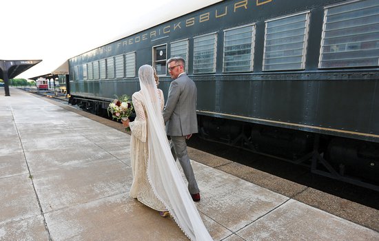 Wedding couple by RF&P train by Amanda Maglione Photography