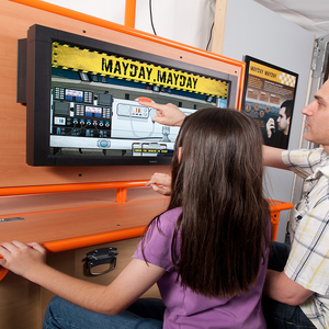 two guests engaging with a mayday computer demonstration.jpg