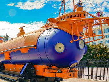 The aluminaut in front of a picturesque sky.