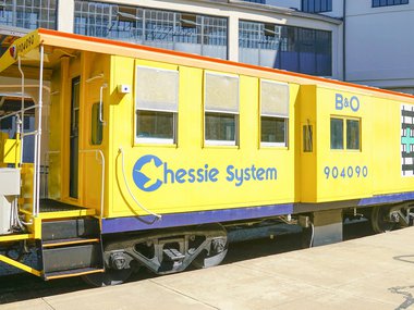 Yellow Chessie System caboose.