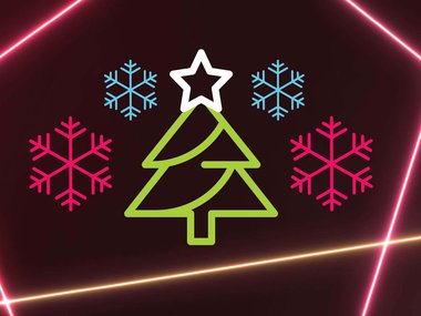 decorative holiday image of laser beams, christmas tree and snow flakes.jpg