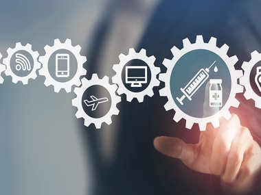 decorative image of open gears. each gear contains an element of technology